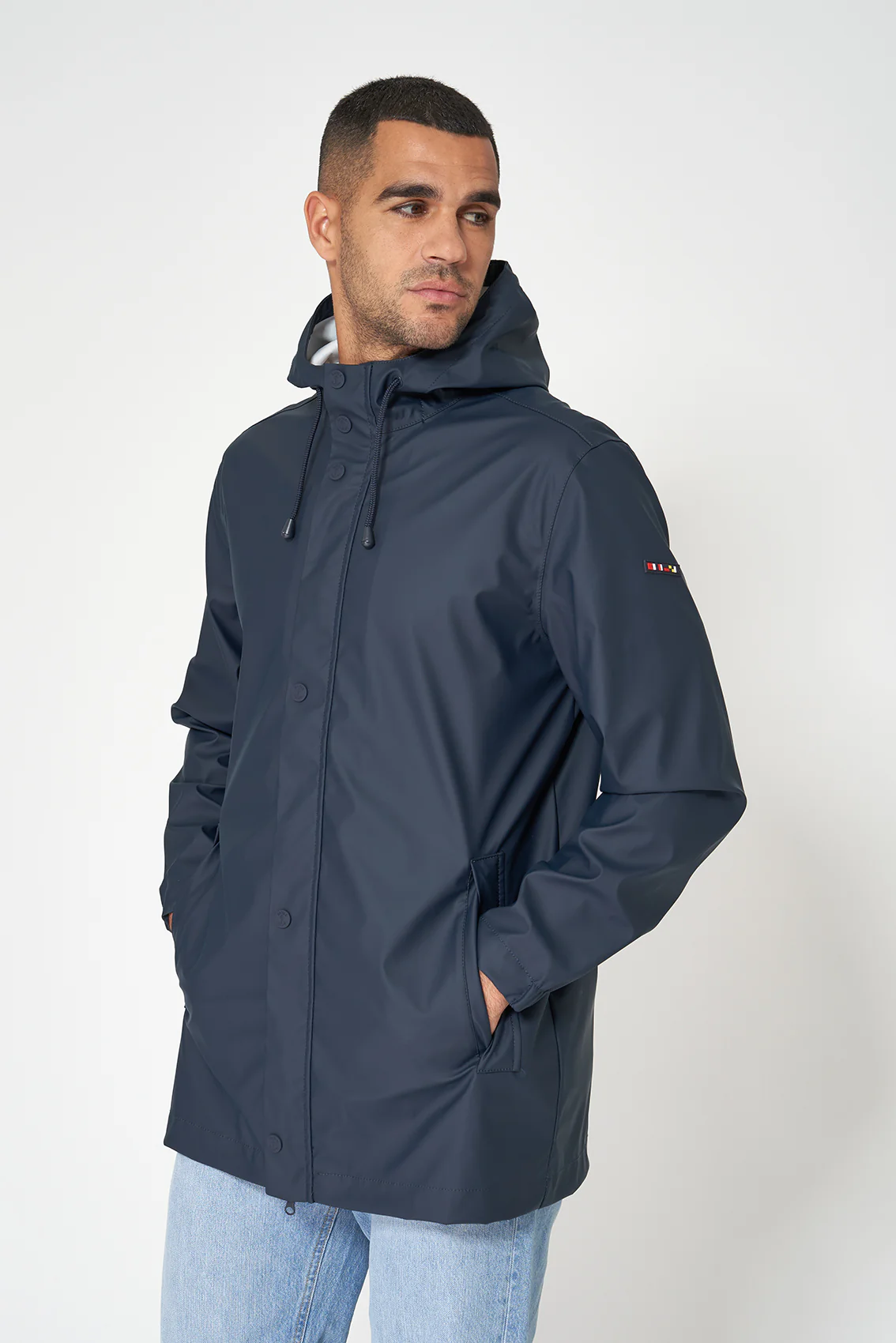 Chubasquero ligero amplio 100% impermeable UNISEX MARINO